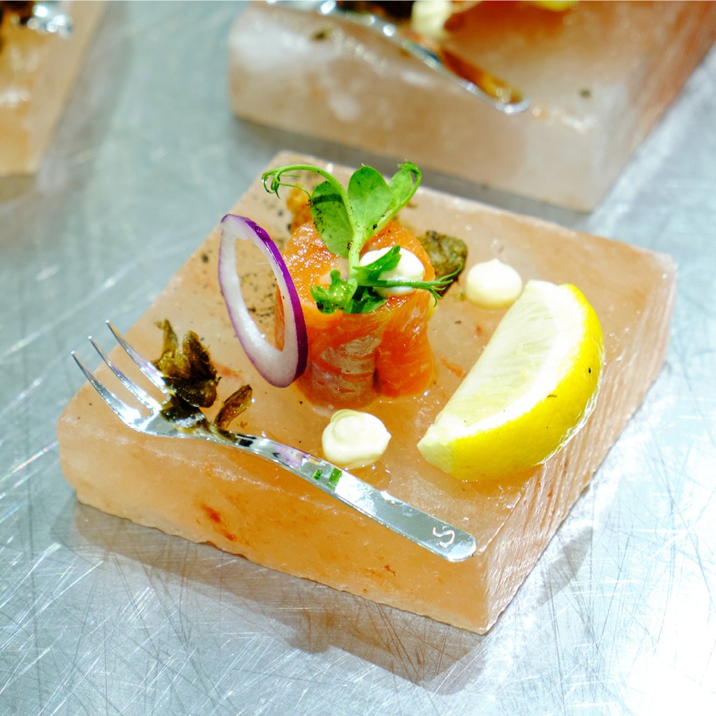 Cured Trout on a Salt Block with Baby Greens, Emulsion and Caviar
